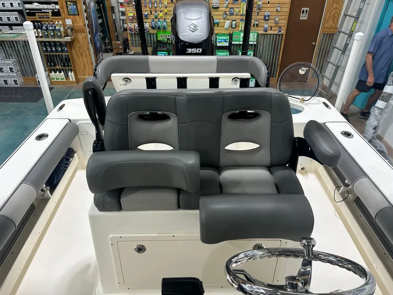 Slide: The Image of 2023 Sea Born FX 25 boat interior with dual seats and steering wheel. - 32