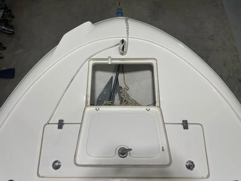 Slide: The Image of 2023 Sea Born FX 25 boat bow with anchor storage compartment. - 38