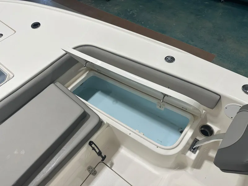 Slide: The Image of 2023 Sea Born FX 25 boat interior with open storage compartment. - 39