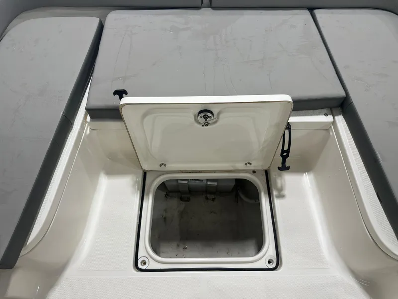 Slide: The Image of 2023 Sea Born FX 25 boat storage compartment with open hatch. - 42