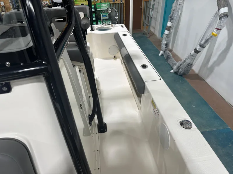 Slide: The Image of 2023 Sea Born FX 25 boat interior with seating and storage compartments. - 47