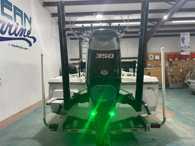 Slide: The Image of 2023 Sea Born FX 25 boat with Suzuki 350 engine in showroom. - 7