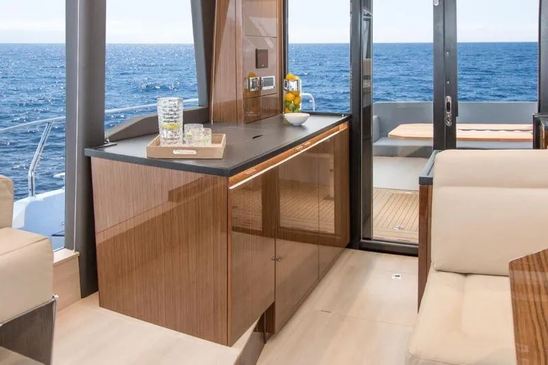 Slide: The Image of Luxurious interior of 2025 Sealine C430 yacht with ocean view and modern furnishings. - 29