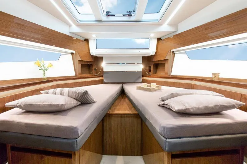 Slide: The Image of Luxurious interior of 2025 Sealine C430 yacht with modern design and skylight. - 35
