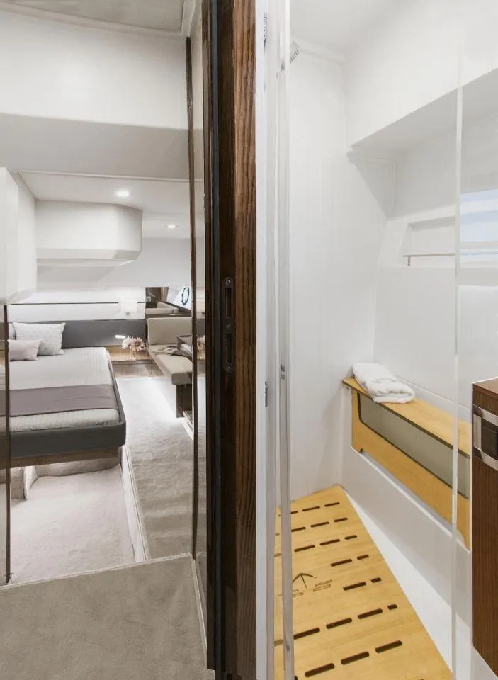 Slide: The Image of 2025 Sealine C430 yacht interior with modern bedroom and sleek bathroom design. - 37