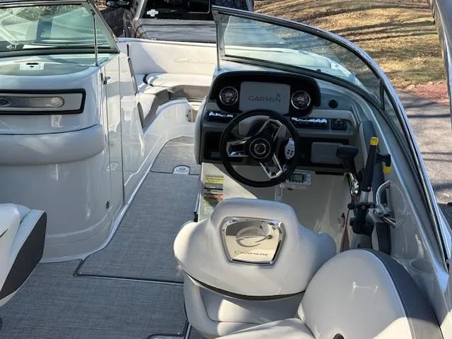 Slide: The Image of Interior of 2020 Crownline Eclipse E255 XS boat with Garmin navigation system. - 7