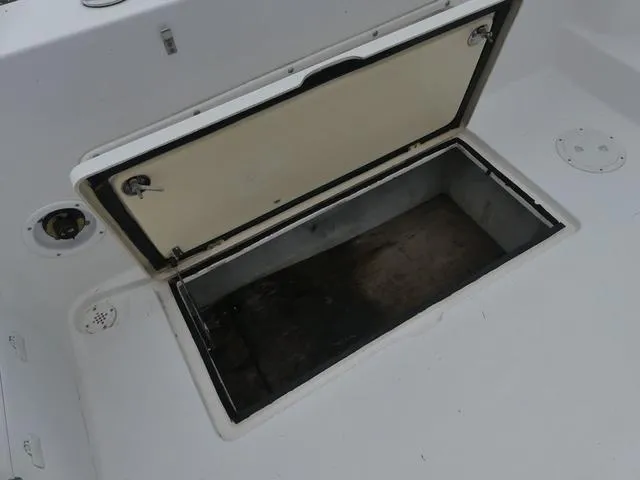 Slide: The Image of Open storage compartment on 2003 Pro Sports Pro Kat 2860 boat. - 10