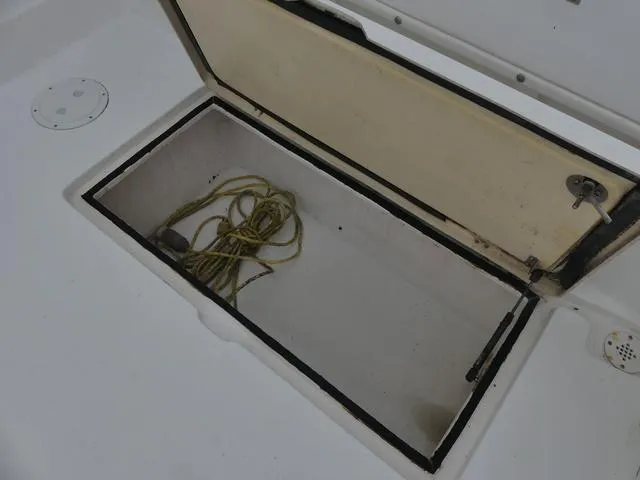 Slide: The Image of Open storage compartment on 2003 Pro Sports Pro Kat 2860 boat. - 11