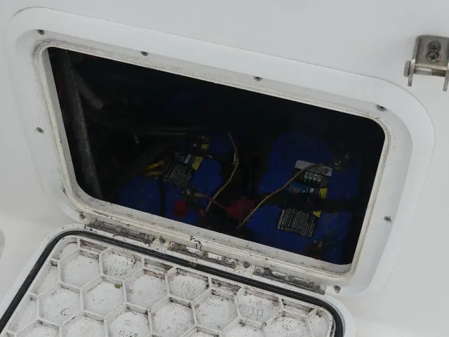 Slide: The Image of Battery compartment of 2003 Pro Sports Pro Kat 2860 boat. - 12