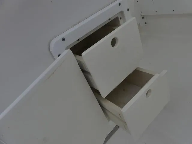 Slide: The Image of Storage drawers on a 2003 Pro Sports Pro Kat 2860 boat. - 19