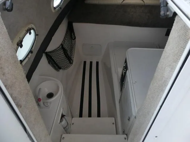 Slide: The Image of 2003 Pro Sports Pro Kat 2860 cabin interior with sink and storage. - 21