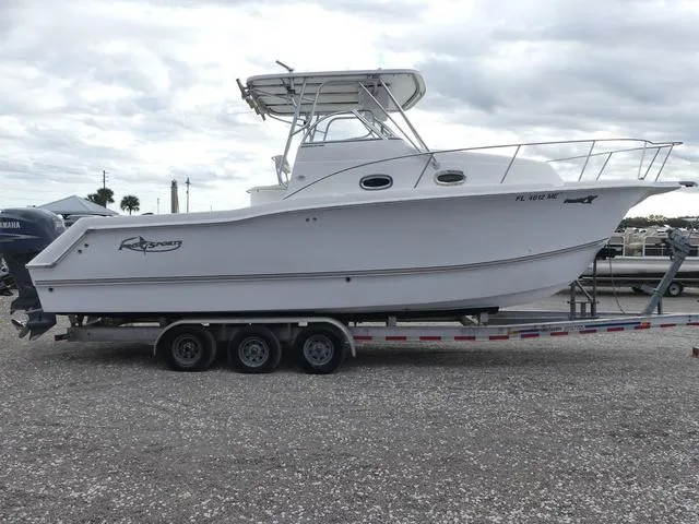 Slide: The Image of 2003 Pro Sports Pro Kat 2860 boat on a trailer, side view. - 5
