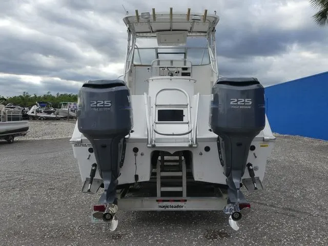 Slide: The Image of 2003 Pro Sports Pro Kat 2860 boat with twin 225 horsepower engines, rear view. - 7