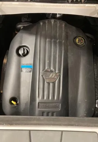 Slide: The Image of 2021 Malibu 23 LSV engine compartment, showcasing a powerful inboard motor. - 9