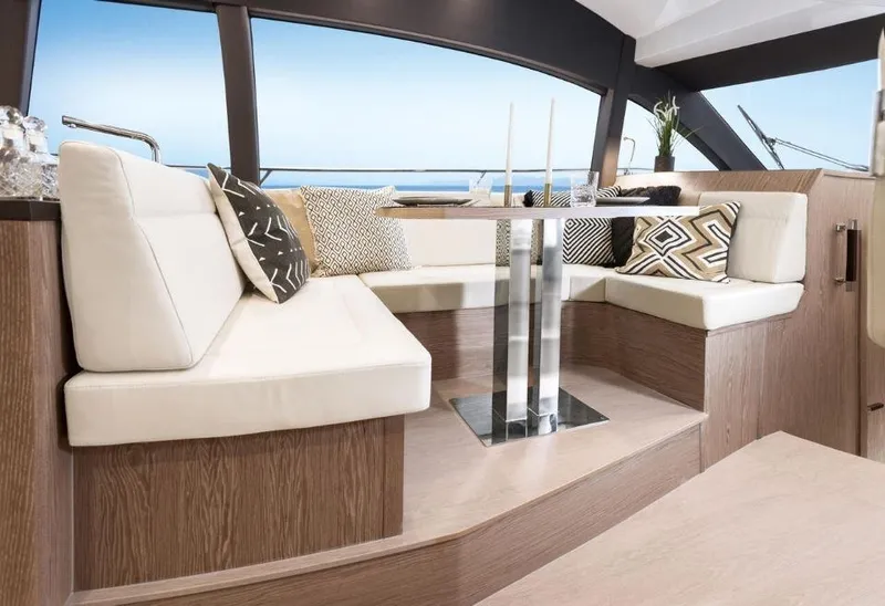 Slide: The Image of Luxurious interior of 2025 Sealine F430 yacht with elegant seating and modern decor. - 15