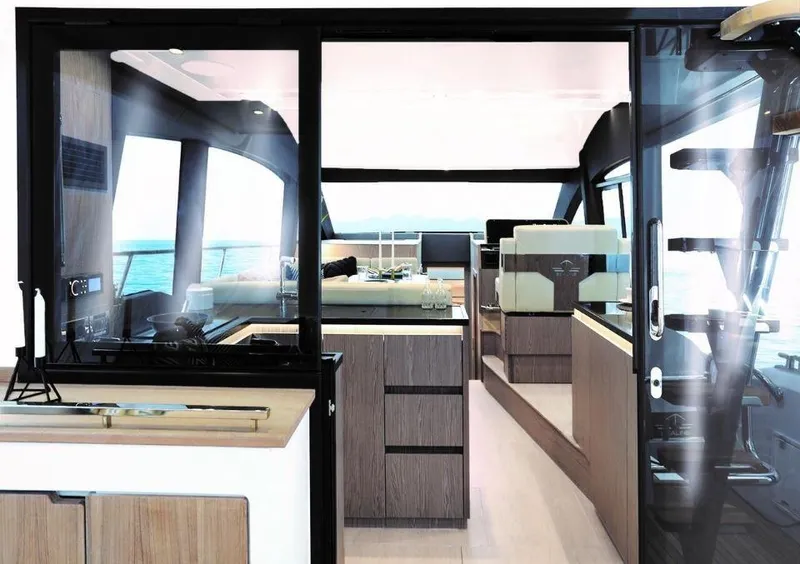 Slide: The Image of Interior view of 2025 Sealine F430 yacht, featuring modern design and luxurious furnishings. - 20