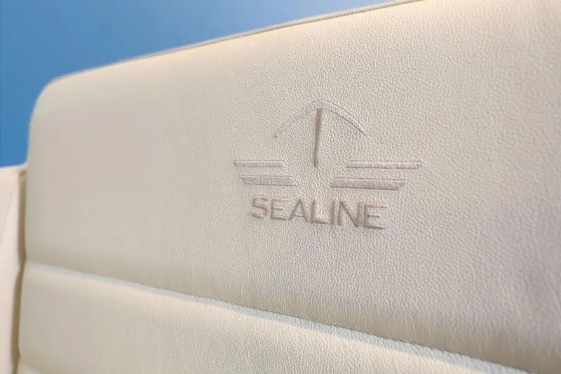 Slide: The Image of 2025 Sealine F430 logo on beige leather upholstery. - 21