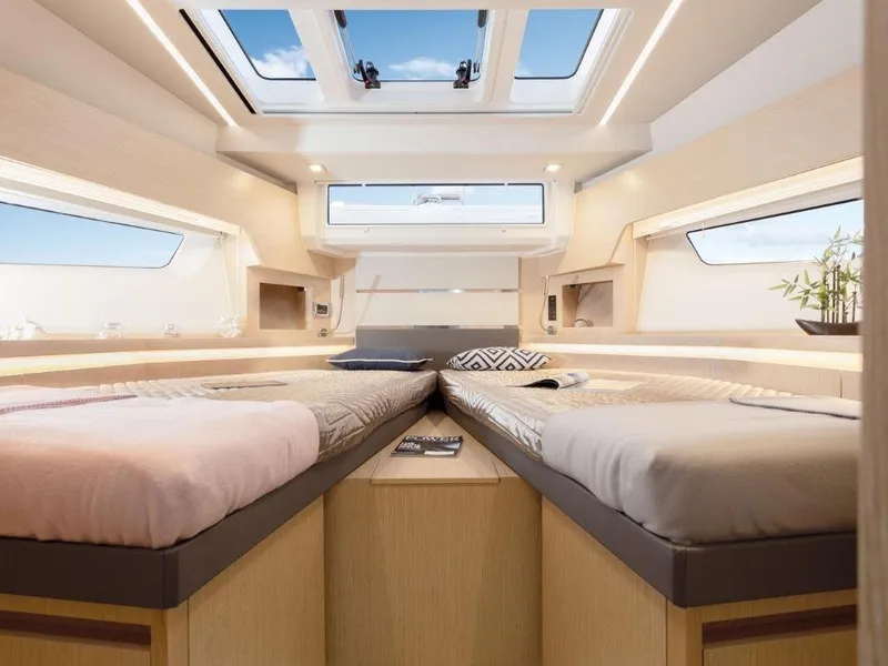 Slide: The Image of Luxurious interior of 2025 Sealine F430 yacht with twin beds and skylight. - 29