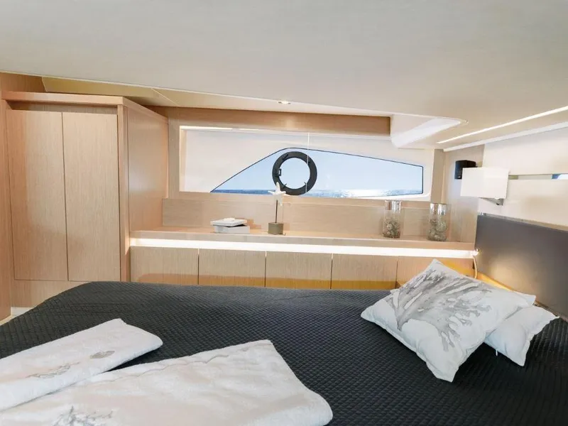 Slide: The Image of Luxurious bedroom interior of 2025 Sealine F430 yacht with modern design and elegant furnishings. - 37