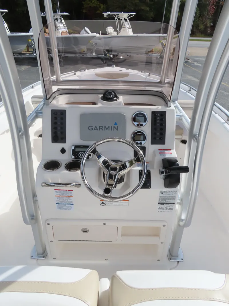 Slide: The Image of 2018 Robalo R222 Center Console boat dashboard with Garmin navigation system. - 12