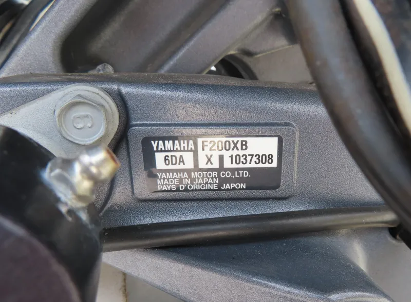 Slide: The Image of Yamaha F200XB engine label on 2018 Robalo R222 Center Console boat. - 26