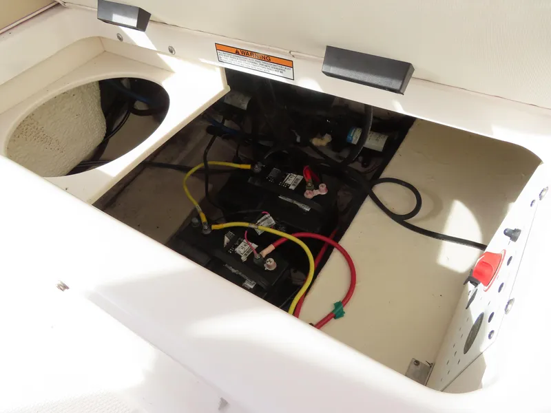 Slide: The Image of 2018 Robalo R222 Center Console battery compartment with wiring. - 27