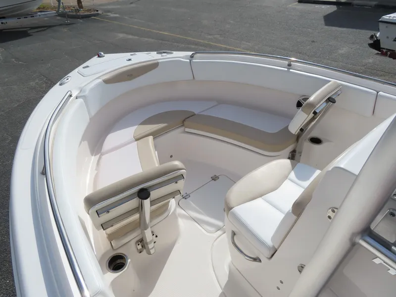 Slide: The Image of 2018 Robalo R222 Center Console boat interior with seating and steering console. - 9