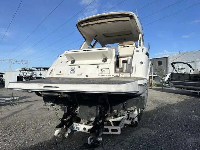 Slide: The Image of 2017 Sea Ray Sundancer 350 Coupe boat, rear view, on dry dock. - 14