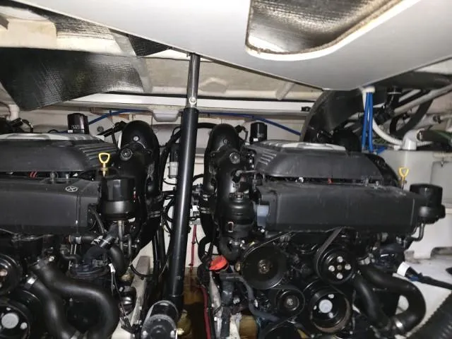 Slide: The Image of Engine room of 2017 Sea Ray Sundancer 350 Coupe with dual engines. - 22