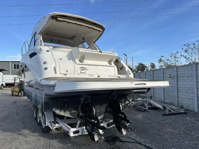 Slide: The Image of 2017 Sea Ray Sundancer 350 Coupe on trailer, rear view, outdoor setting. - 29