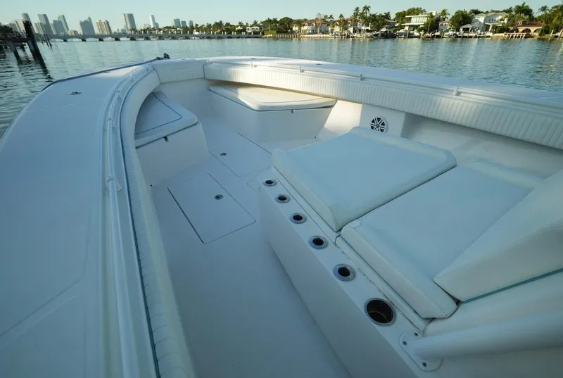 Slide: The Image of 2016 SeaHunter 41 Tournament boat interior with spacious seating and waterfront view. - 20