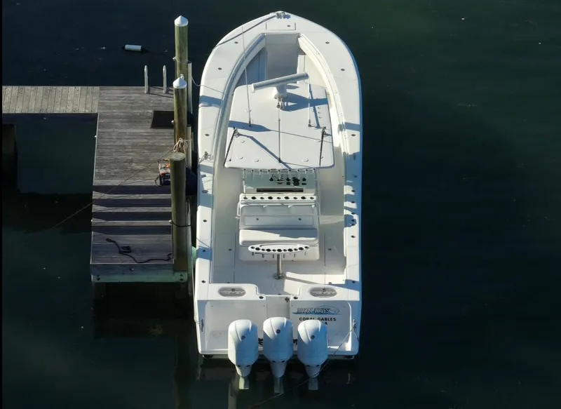 Slide: The Image of Aerial view of 2016 SeaHunter 41 Tournament boat docked with triple outboard engines. - 5