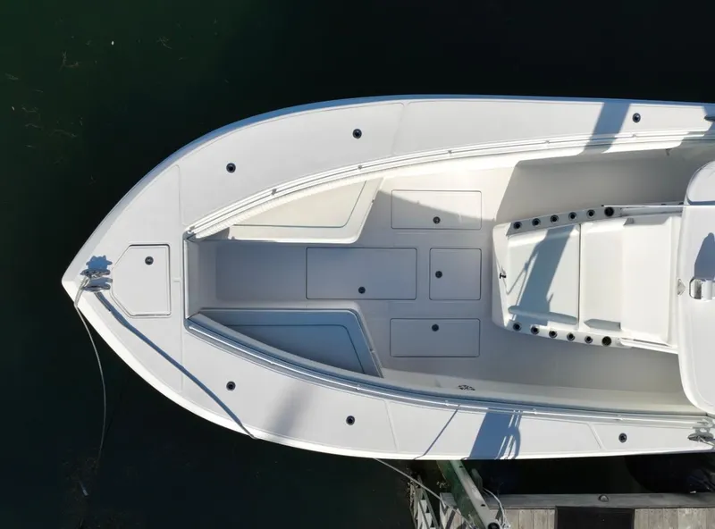 Slide: The Image of Aerial view of 2016 SeaHunter 41 Tournament boat, white deck, docked. - 6