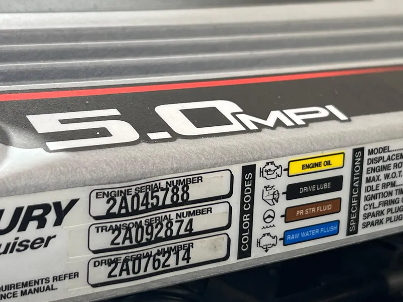 Slide: The Image of Close-up of a 5.0 MPI engine label with serial numbers and color codes. - 19