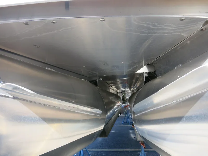 Slide: The Image of Underneath view of 2024 Godfrey Monaco 235SD pontoon boat, showcasing sleek aluminum construction. - 29