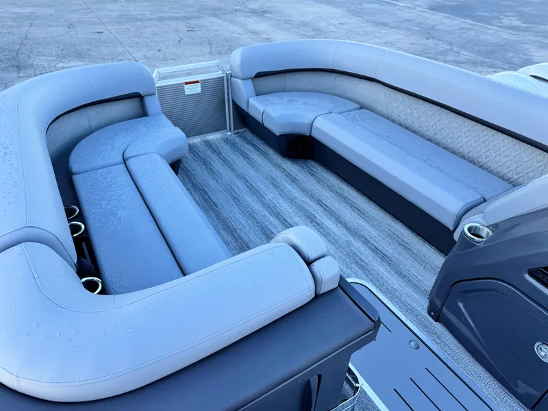 Slide: The Image of 2025 Bennington 24 MFB pontoon boat interior with spacious seating and modern design. - 18