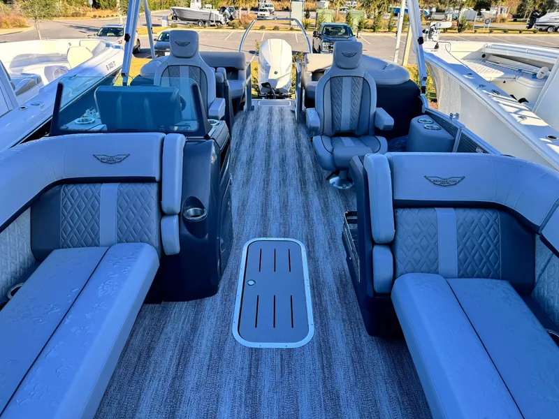 Slide: The Image of 2025 Bennington 24 MFB boat interior with luxurious seating and modern design. - 20