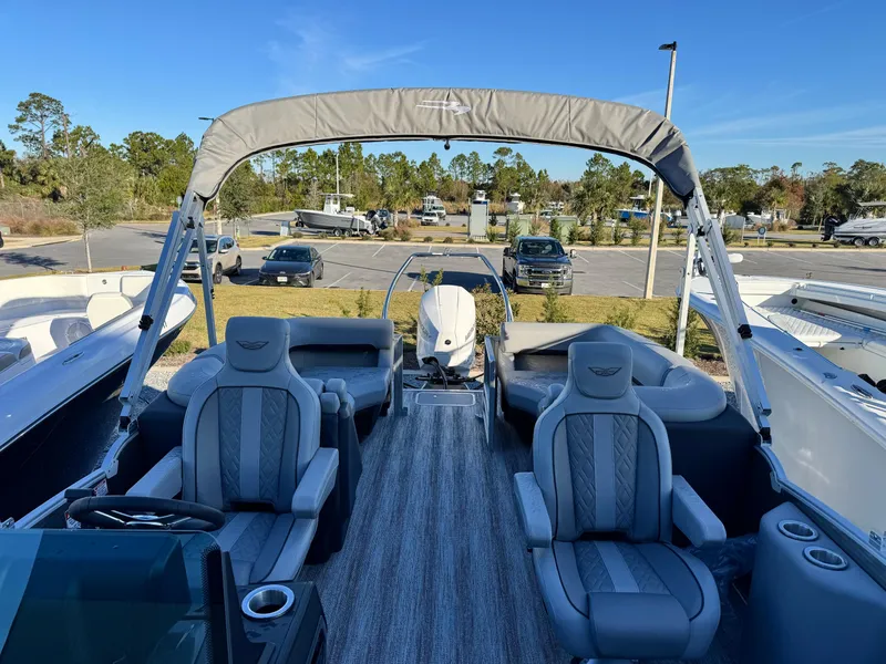 Slide: The Image of 2025 Bennington 24 MFB boat interior with plush seating and modern design. - 21