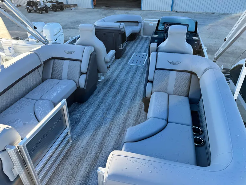 Slide: The Image of 2025 Bennington 24 MFB pontoon boat interior with luxurious seating and modern design. - 8