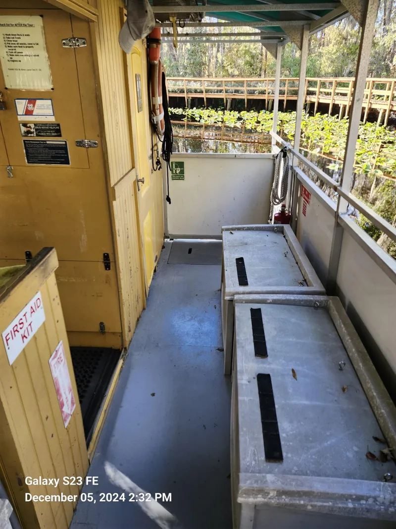 Slide: The Image of Interior of 2016 Rover Marine Carolina Rover 40 with storage boxes and first aid kit. - 10