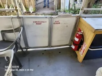 Slide: The Image of Interior of 2016 Rover Marine Carolina Rover 40 with emergency exit and fire extinguisher. - 12