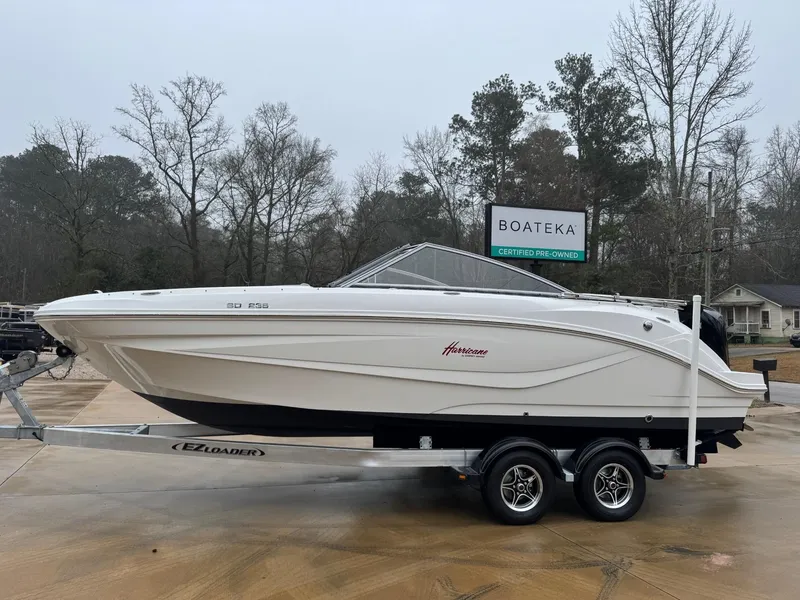 The Image of 2022 Hurricane SunDeck 235 OB boat on trailer, parked outdoors at Boateka of West Georgia. - 0