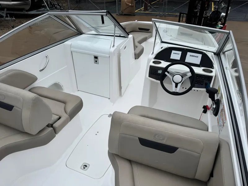 Slide: The Image of Interior seating of 2022 Hurricane SunDeck 235 OB boat with cup holders. - 5