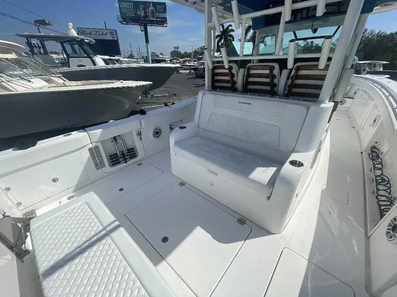 Slide: The Image of 2021 Caymas 401 CC boat interior with seating and storage compartments. - 26