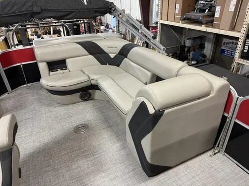 Slide: The Image of 2022 Forest River Trifecta boat interior with beige and black seating. - 9