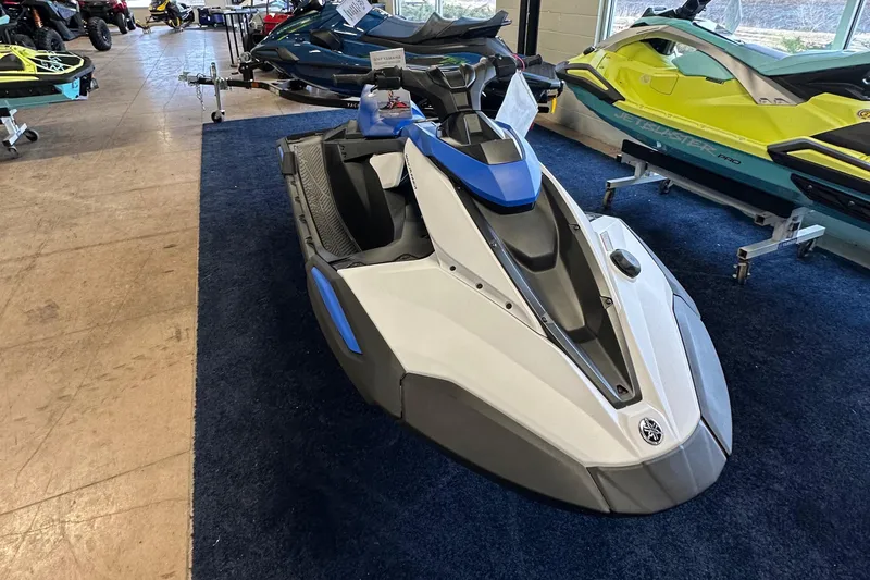 Slide: The Image of 2025 Yamaha WaveRunner JetBlaster in showroom, featuring sleek design and blue accents. - 4