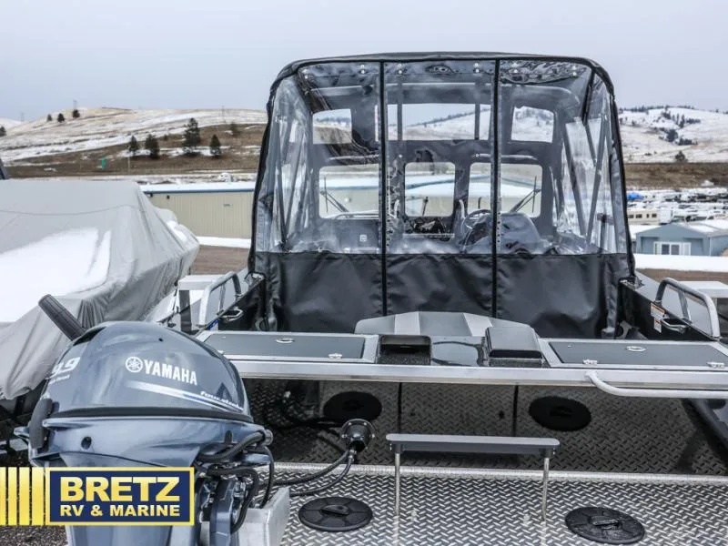 Slide: The Image of 2025 River Runner 180 boat with Yamaha motor at Bretz RV & Marine dealership. - 5