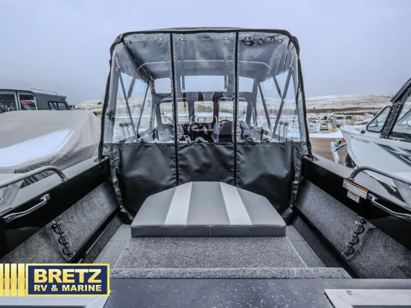 Slide: The Image of River Runner 180 boat interior, 2025 model, at Bretz RV & Marine dealership. - 6