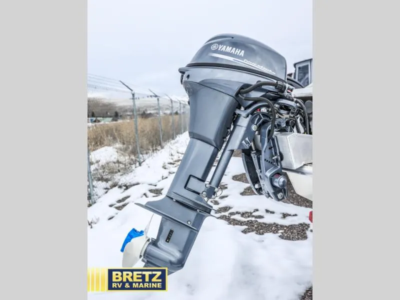 Slide: The Image of Yamaha outboard motor on River Runner 180, 2025 model, displayed at Bretz RV & Marine. - 7