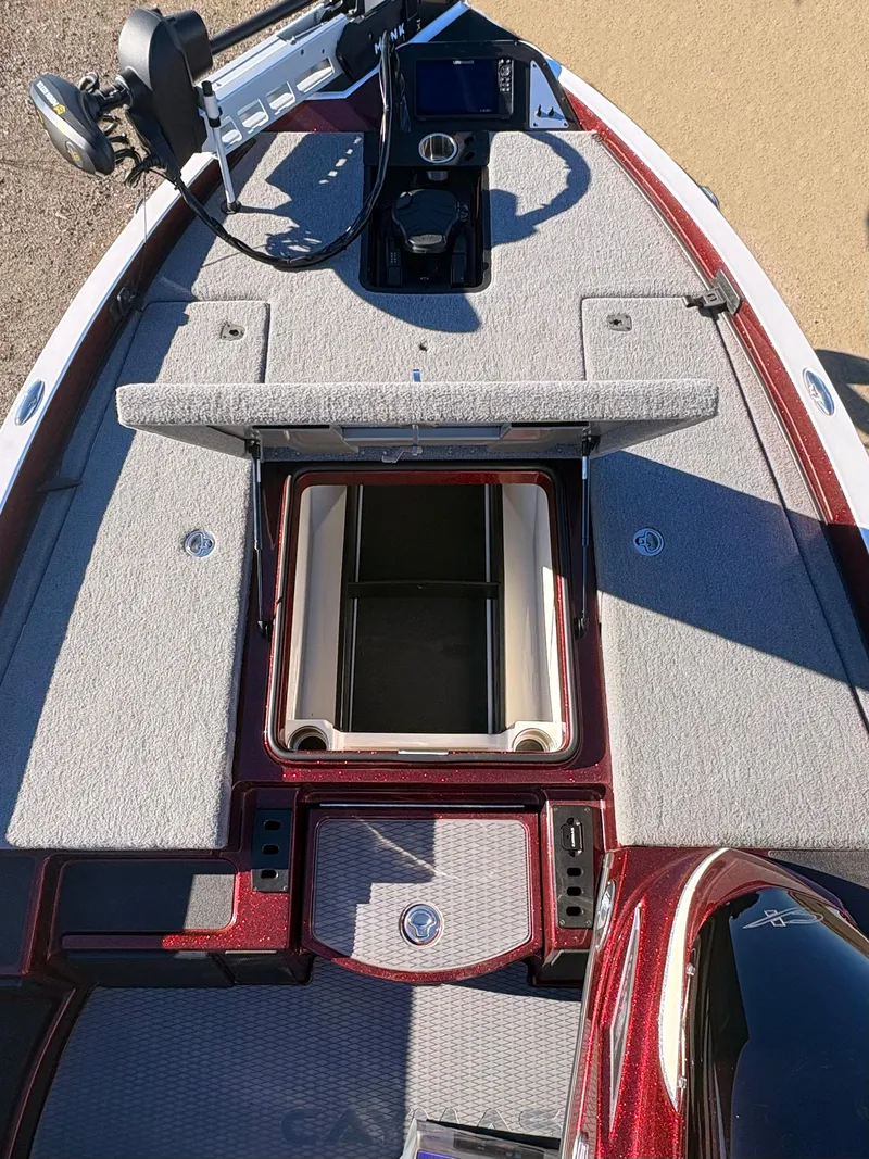 Slide: The Image of 2023 Caymas CX 18 SS boat interior with open storage compartments. - 6